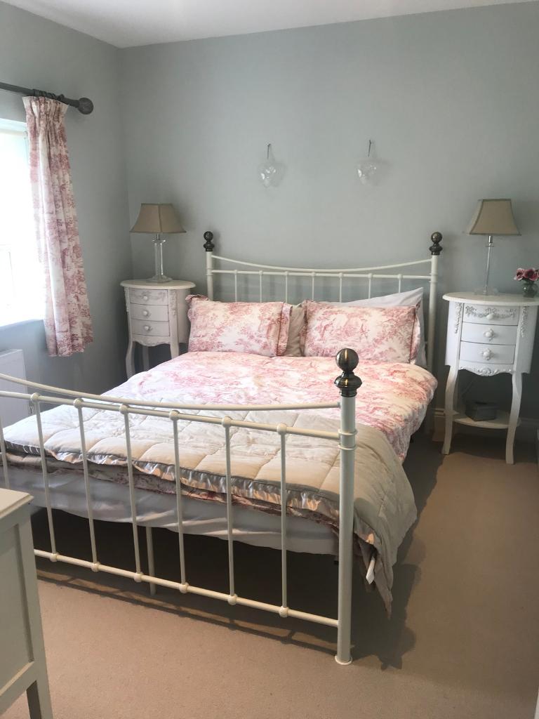 Cream metal double bed frame and mattress in Bedford, Bedfordshire