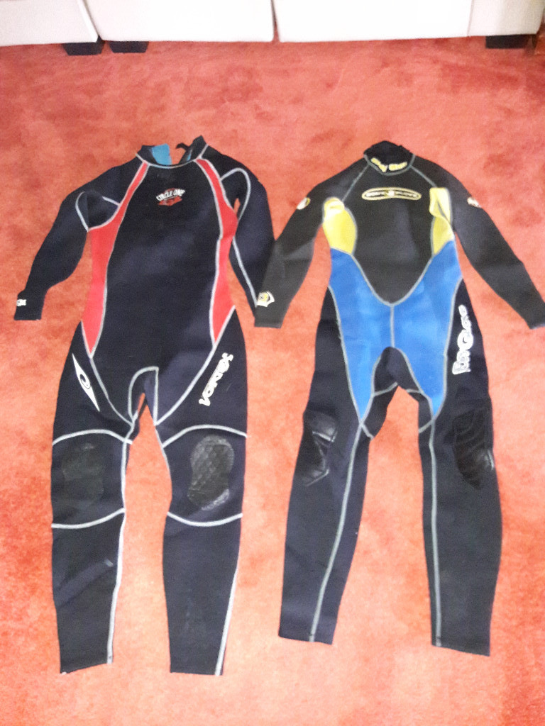 Water skiing starter set skis, pole, 4 life vests, 2 wetsuits in