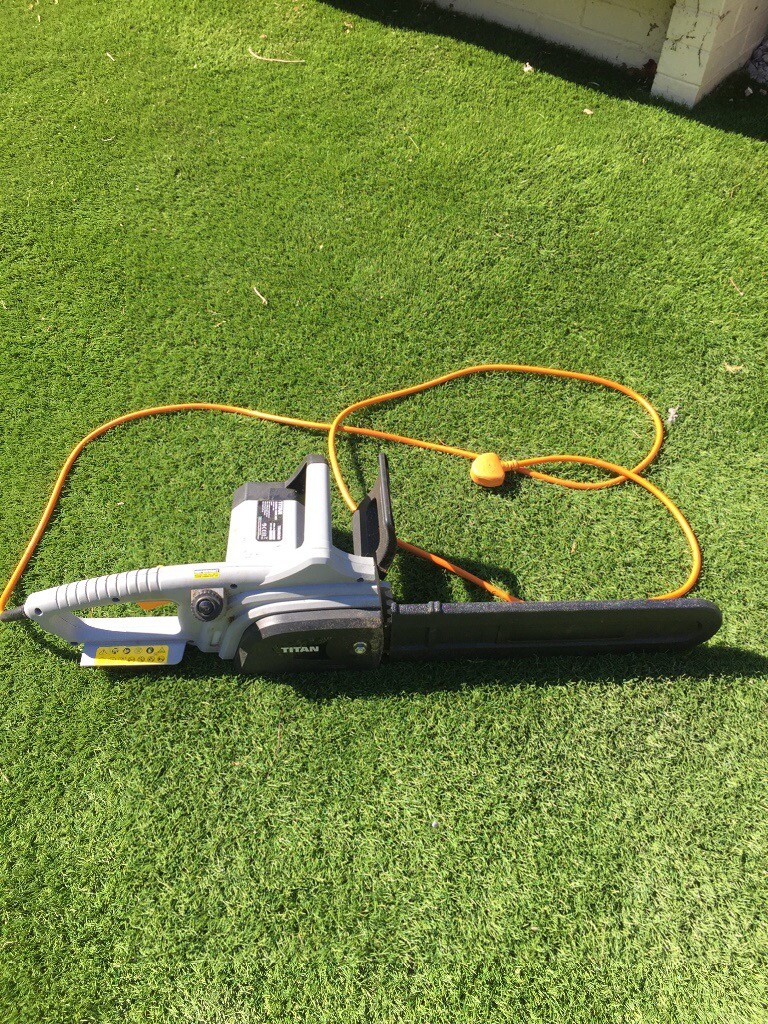 Screwfix electric chainsaw and tree branch shredder in Newcastle