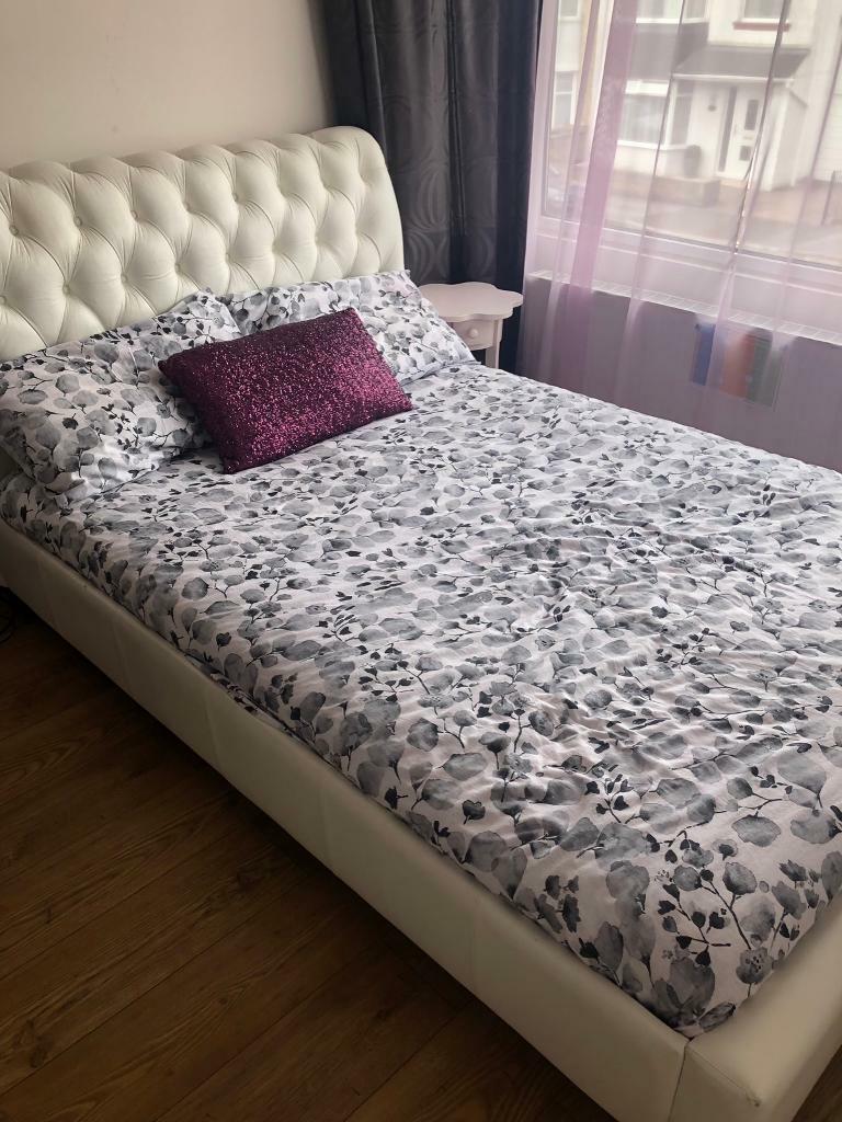 Marks and Spencer Cream leather double bed with mattress in
