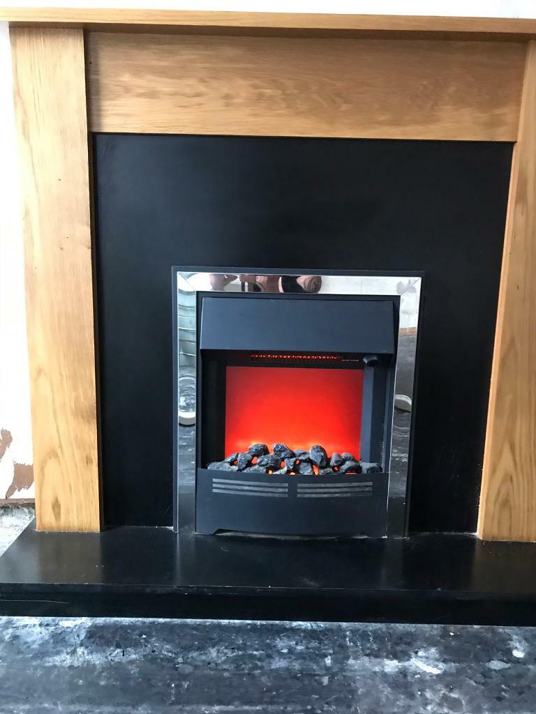 Electric coal effect fire and durround in Middleton, Manchester Gumtree