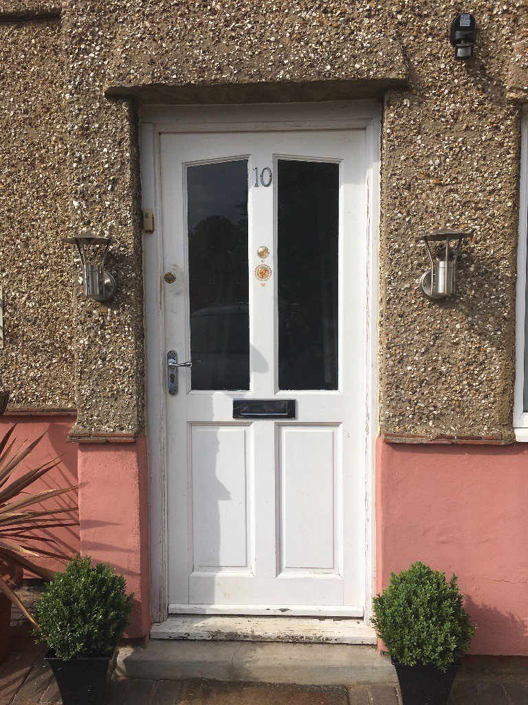 SOLID WOOD FRONT DOOR with clear glass panels in
