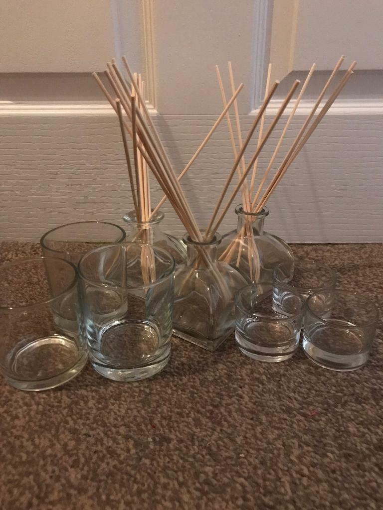 11 items comprising 5 clear glass reed diffusers with new reeds and 6