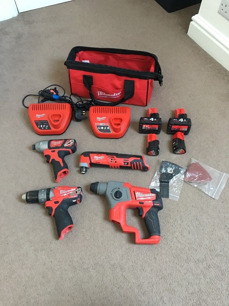 Milwaukee M12 set. 4 power tools and 4 batteries/ 2 chargers. comes
