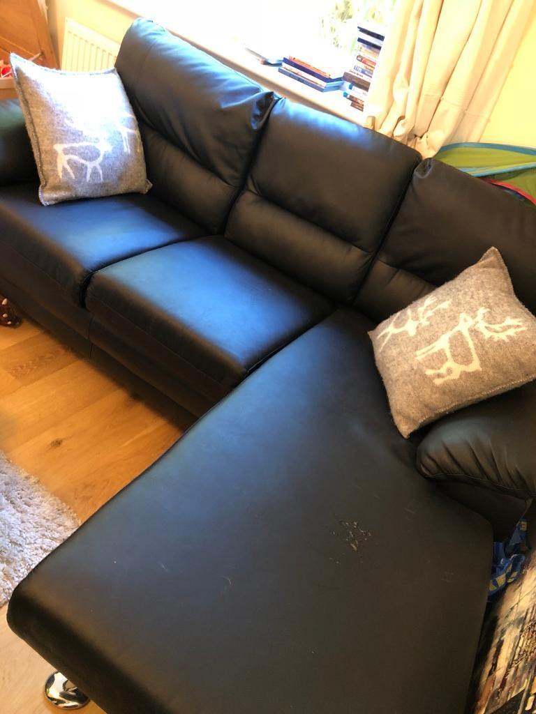 Three seater corner sofa. Black leather in Spencers Wood, Berkshire