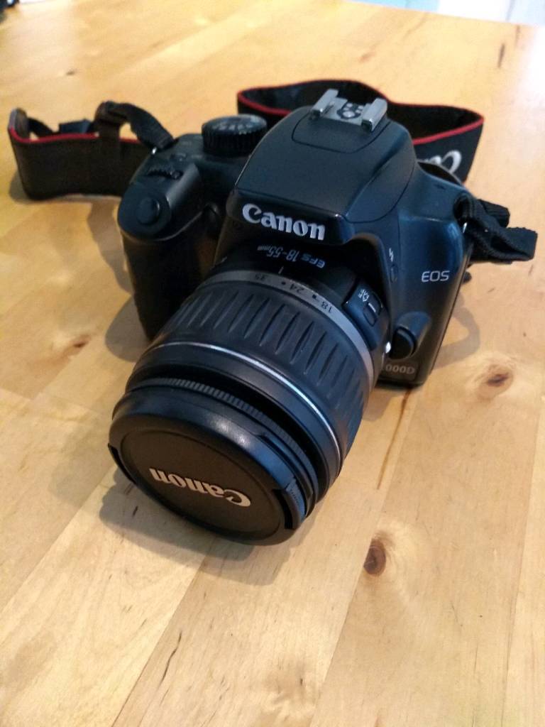 Canon EOS 1000D camera with 18-55mm lens and case