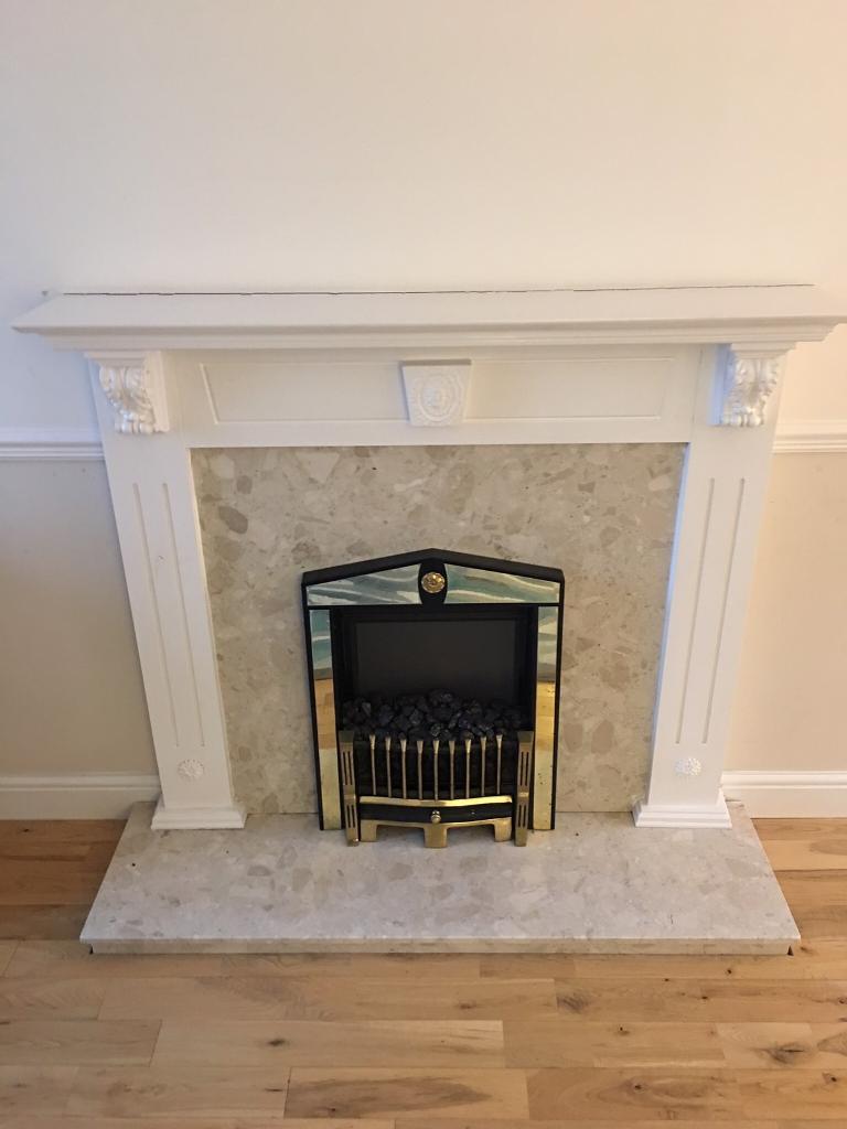 White fireplace with marble surround and hearth in Burnside, Glasgow