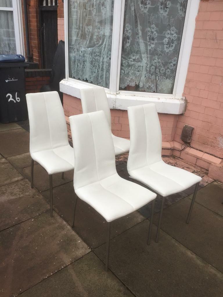 4 lovely white leather dining chairs in Handsworth, West Midlands