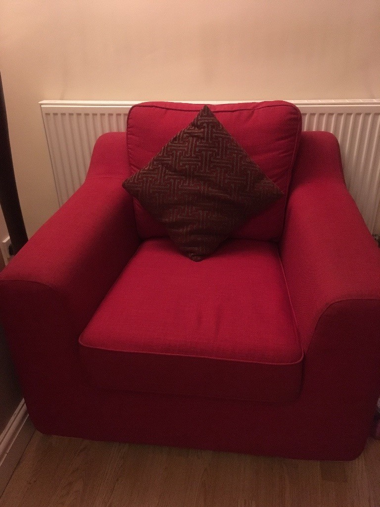 Red two seater sofa bed and matching armchair | in Ruddington