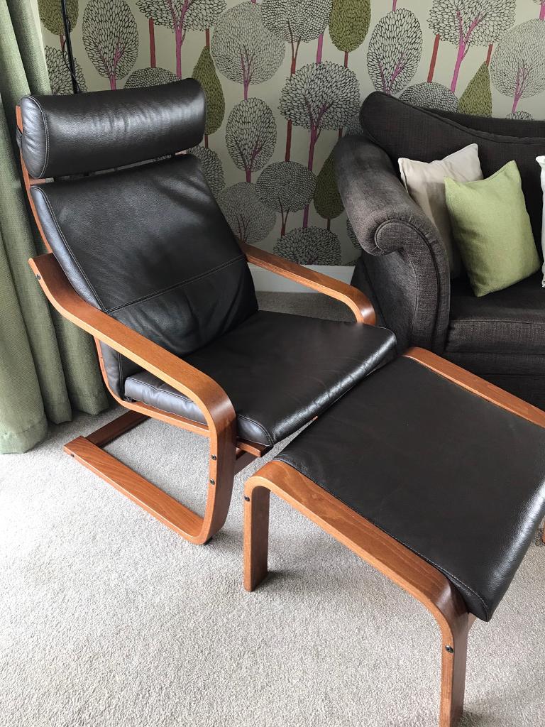 IKEA Poang dark wood chair and footstool with dark brown leather