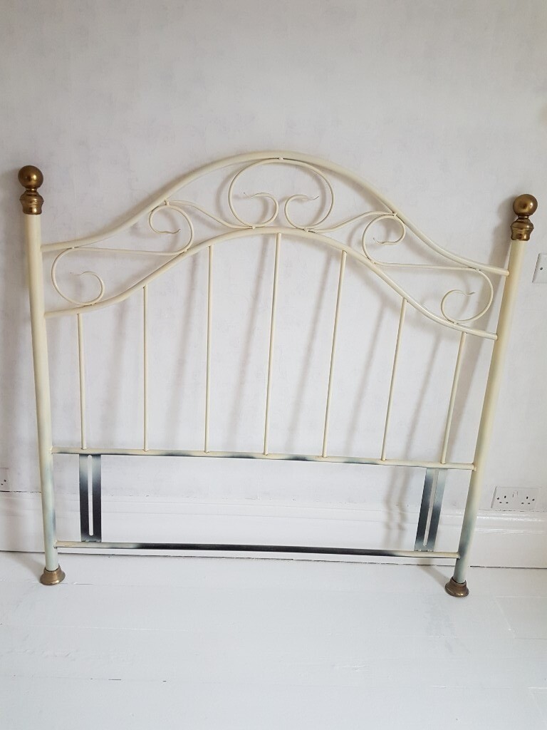 Cream metal double bed headboard with brass/gold finials. in Exeter, Devon Gumtree