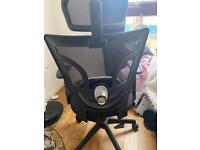 Black ergonomic mesh chair office desk