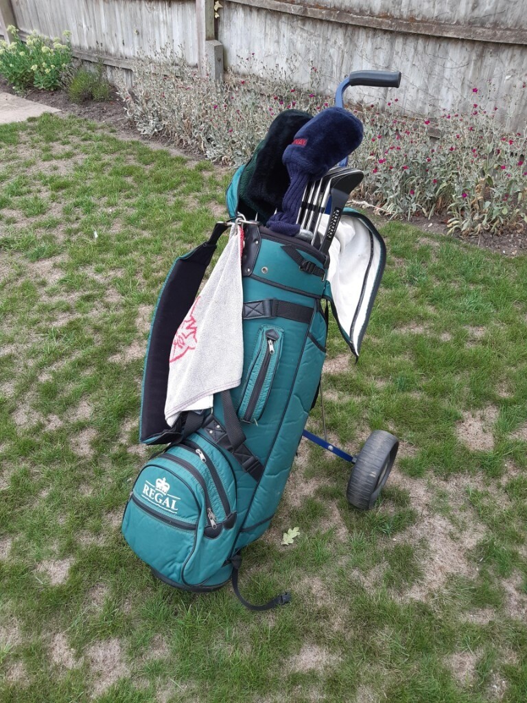 Full set of Spalding and Regal golf clubs, including bag and trolley