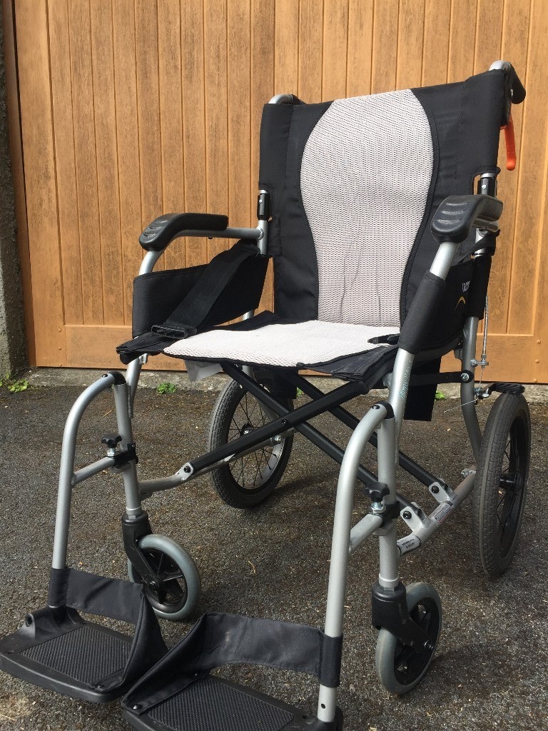 Karma Ergo Lite 2 manual wheelchair with seat belt and cushion, barely