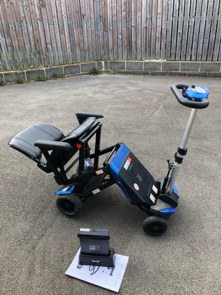 SOLAX AUTOMATIC FOLDING MOBILITY SCOOTER WITH EXTRA BATTERY AND DOCKING