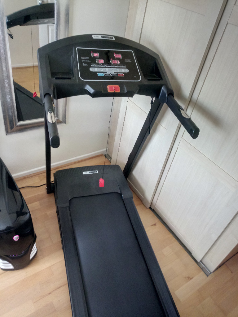 Pro Fitness electronic treadmill. Includes built in speaker and full