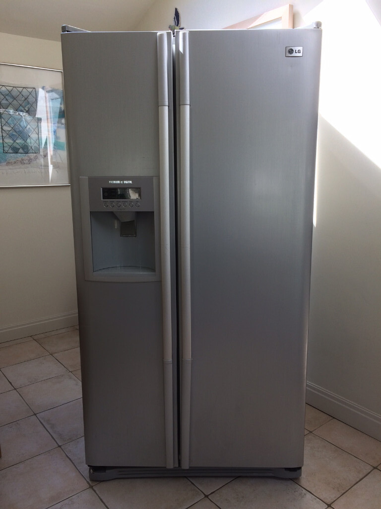 LG fridge freezer in silver with ice maker and water chiller in
