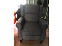 Brand new reclining armchair in grey blue.