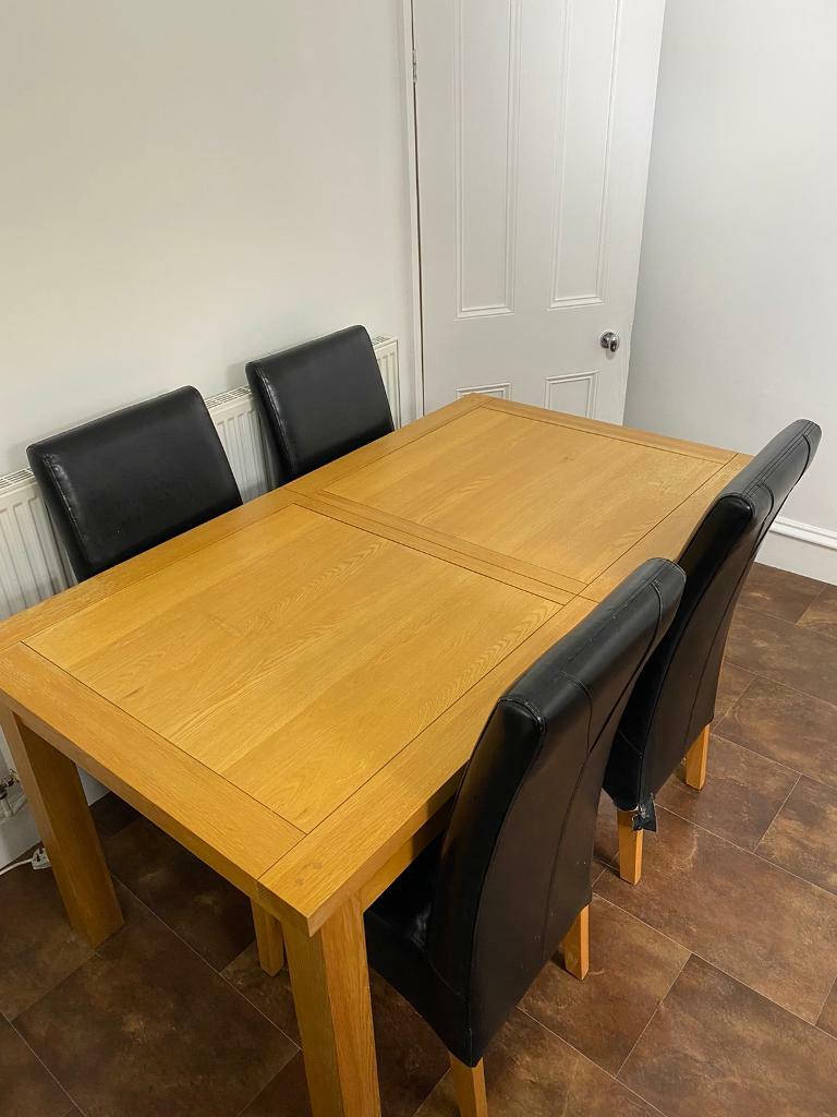 Solid oak extendable dining table in Ecclesfield, South Yorkshire