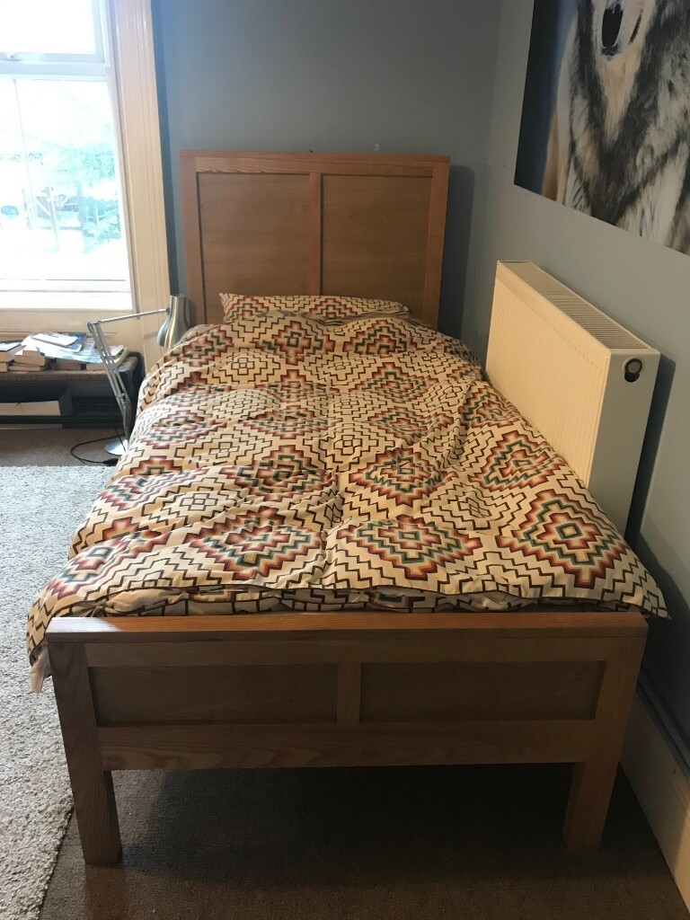 Feather and Black wooden single bed frame in Gloucester Road, Bristol