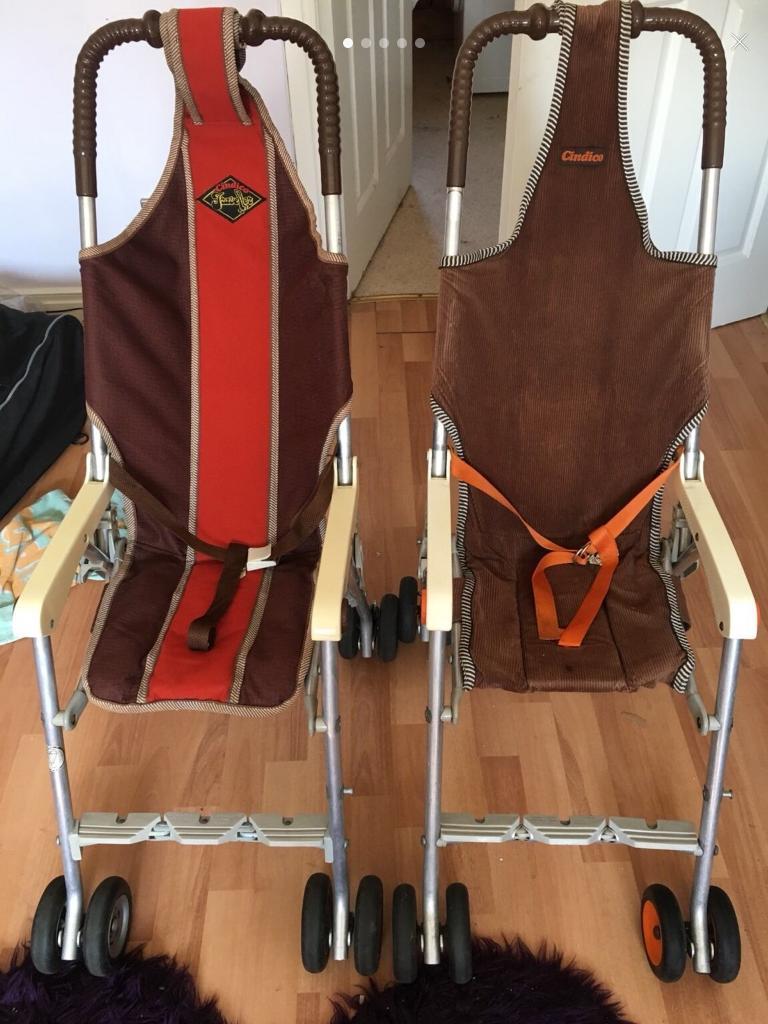 2 x Vintage cindico pushchairs. One is a traveller the other is not