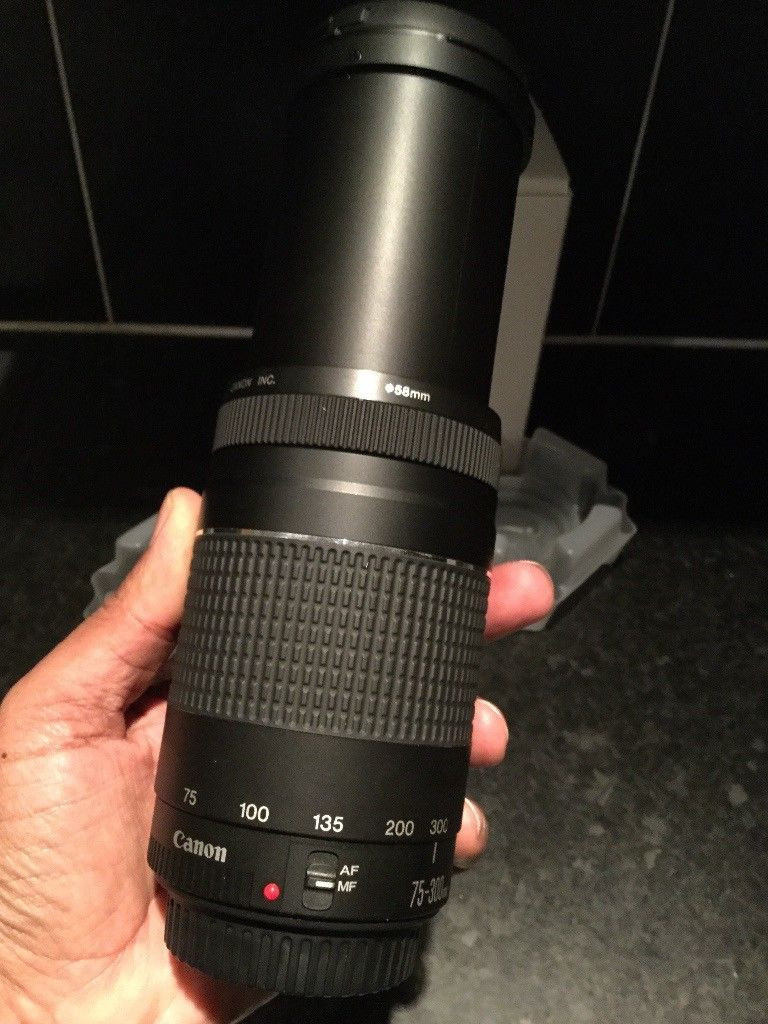 New Canon zoom lens 75300mm 1.5m/4.9ft AF MF Good for distance and