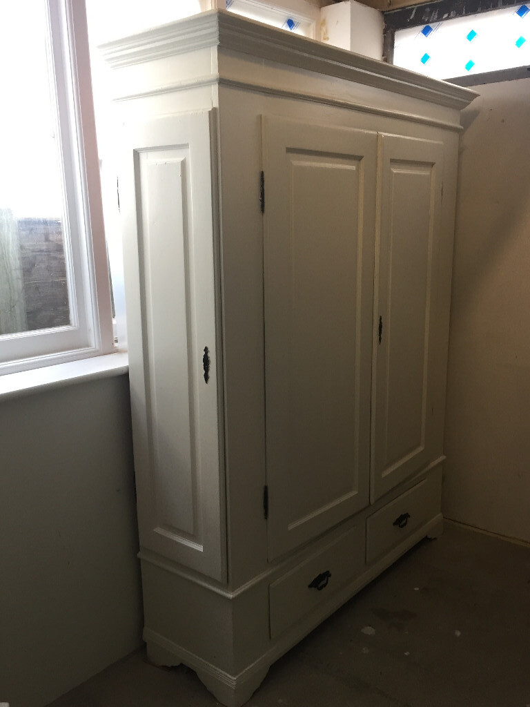 Solid wood linen/storage cupboard painted in Farrow & Ball Wimborne