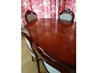 Mahogany dining table and 6 chairs