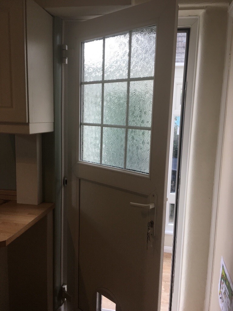 White upvc external patio door with cat flap for sale excellent