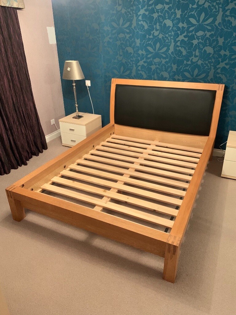 Solid wood Double bed frame with black leather headboard. in