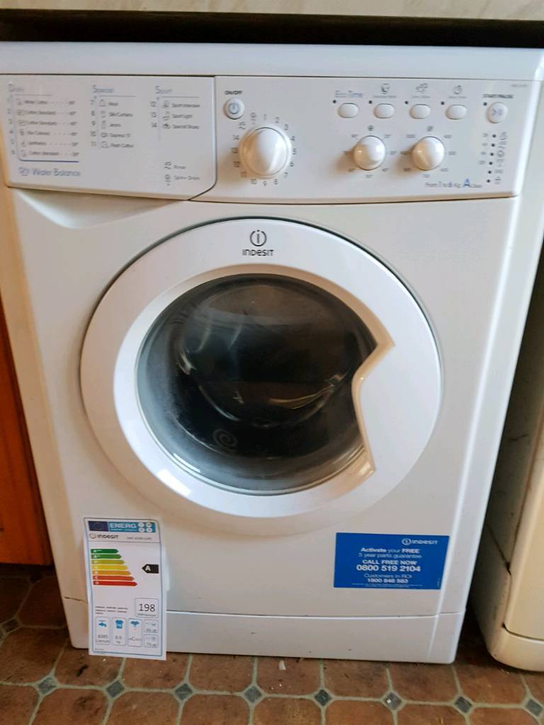 Indesit Washing machine house clearance from Ashtead. Surrey. Buyer