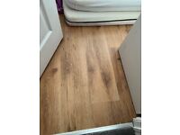 Used brown 7mm laminate flooring with skirting boards for sale