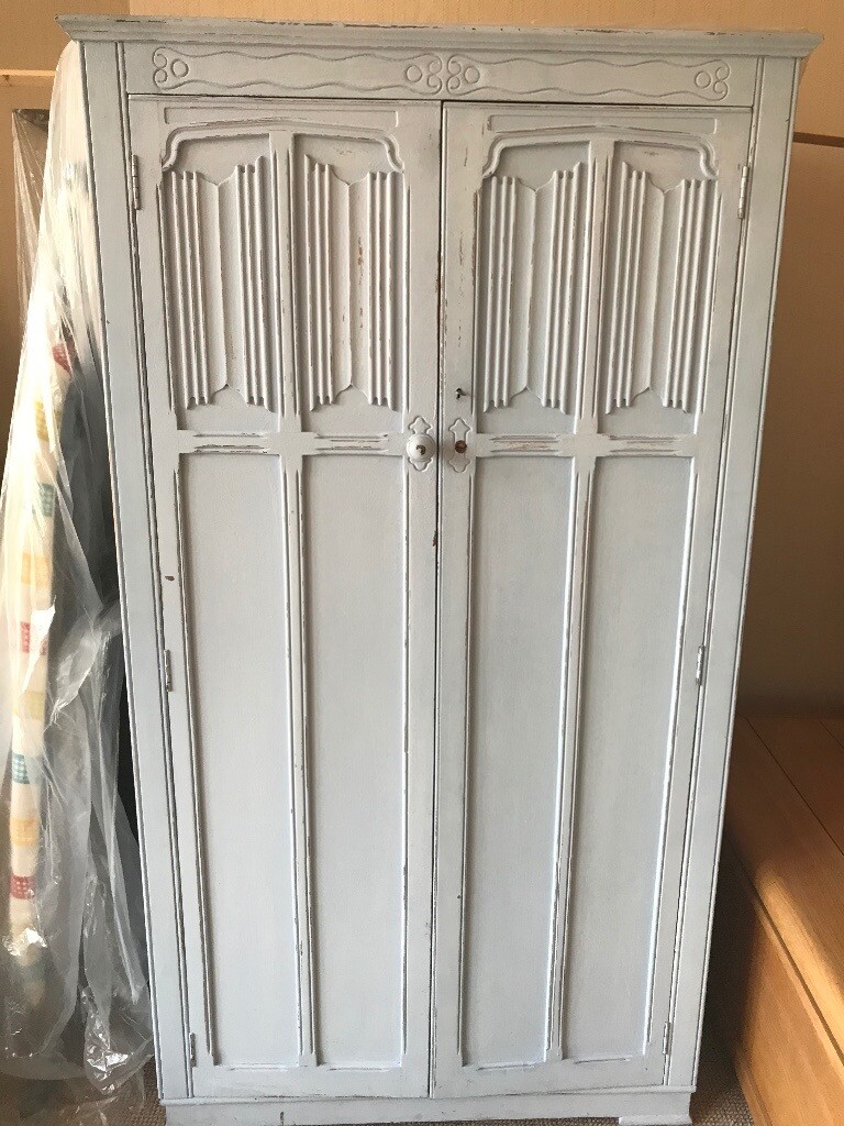 Lovely wardrobe painted in pale blue with shelving inside 172cm H. 96cm
