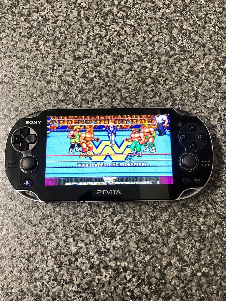 128gb PlayStation vita console with 15,000 games (good condition) in