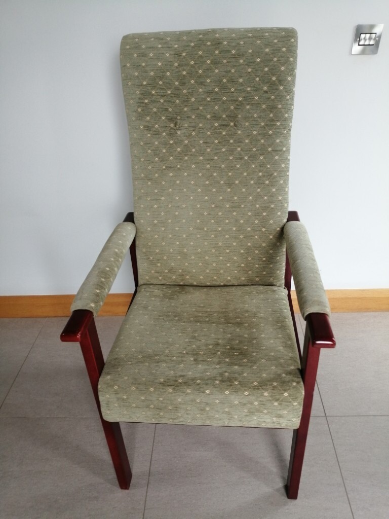 High Straight backed armchair suitable for an elderly person in
