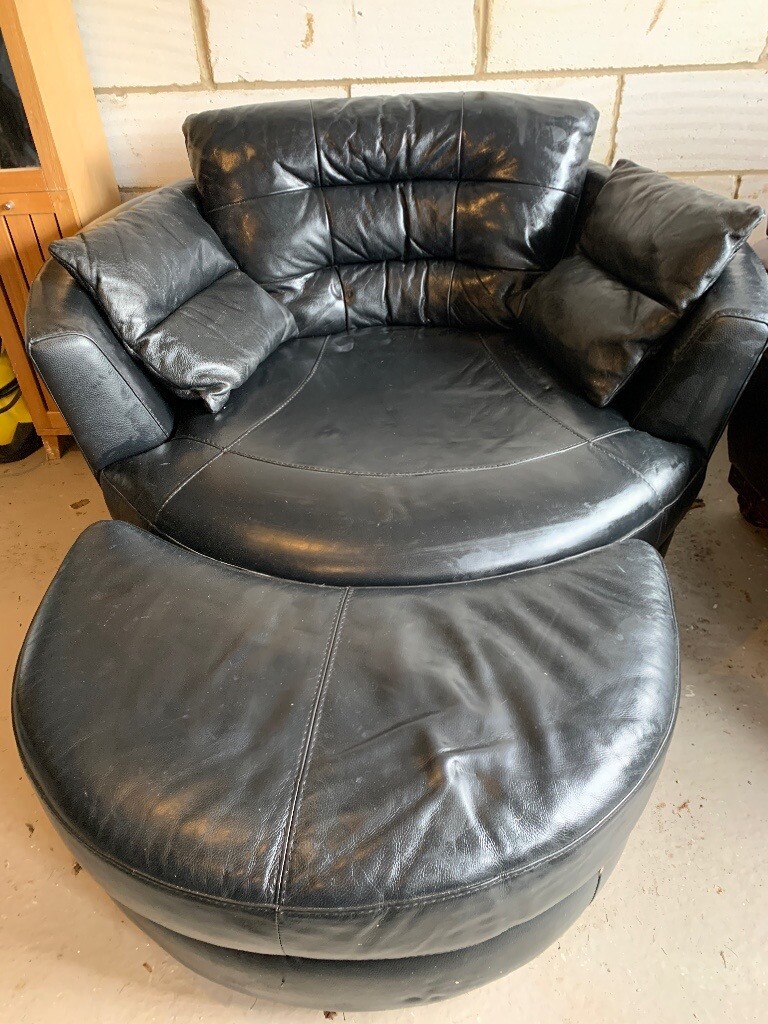 Black leather swivel chair and footstool in Norwich, Norfolk Gumtree