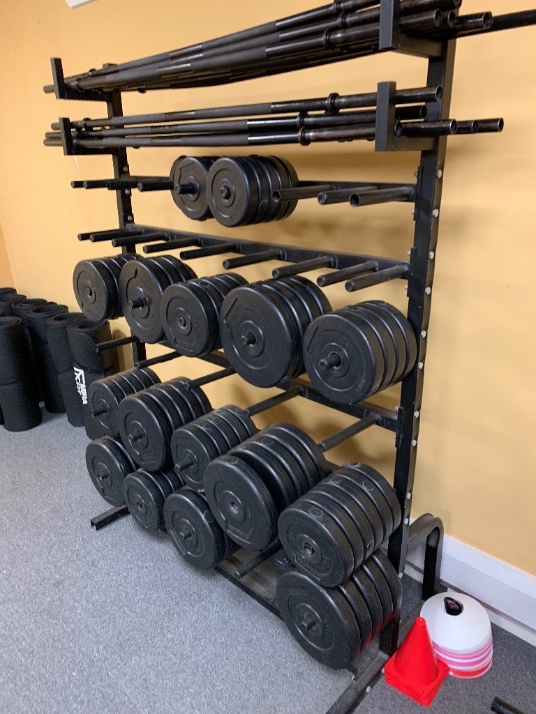 Body pump weights plus storage rack stuadio weight set) in