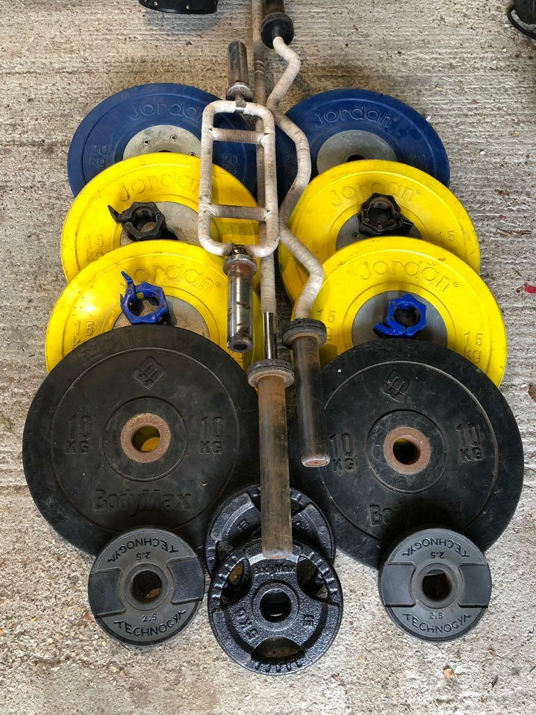 Olympic Weights...with bars and collars.2” bar fittings. W in