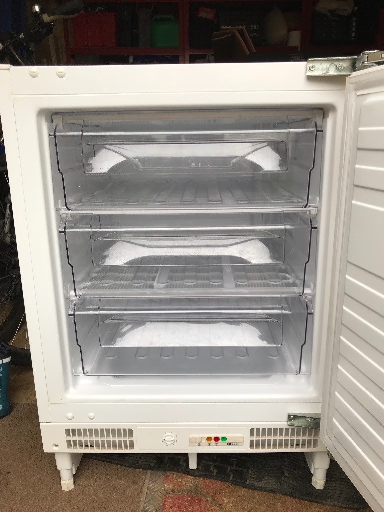 Whirlpool integrated under counter freezer in Addlestone, Surrey