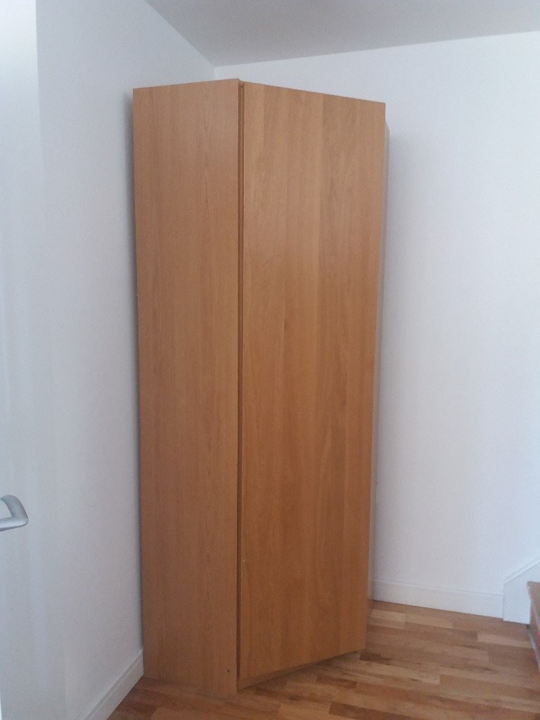 Ikea Corner Wardrobe With One Door Hanging Rail And A Shelf In