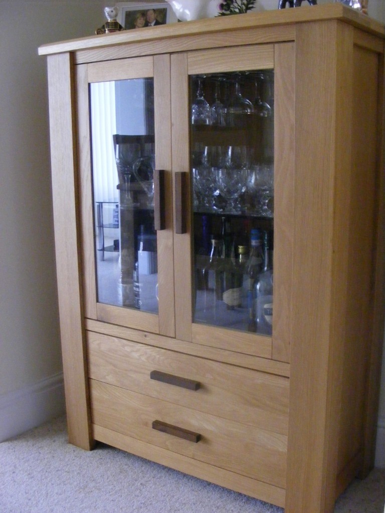 SOLID OAK DRINKS CABINET WITH GLASS SHELF, LIGHT AND GLASS HOLDERS | in