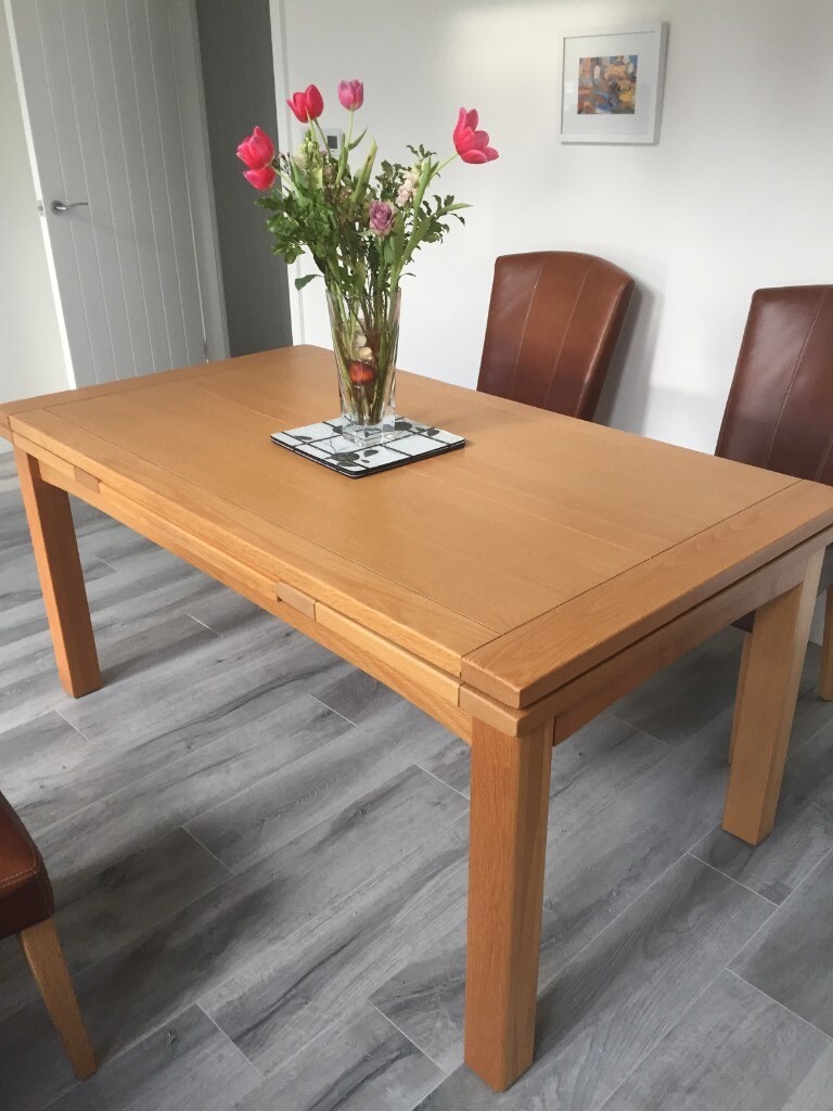 Oak Dining Table sits up to 8 people when extended in Woodthorpe