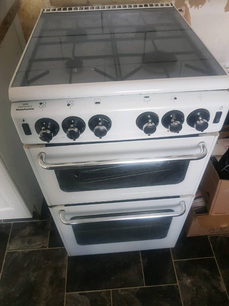 Gas cooker. Double oven with grill and lid. 50cm wide in Stratford