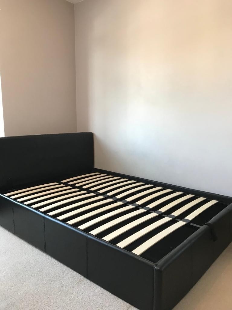 Large Single Ottoman Bed with mattress and 2 Ikea Shelving Units in