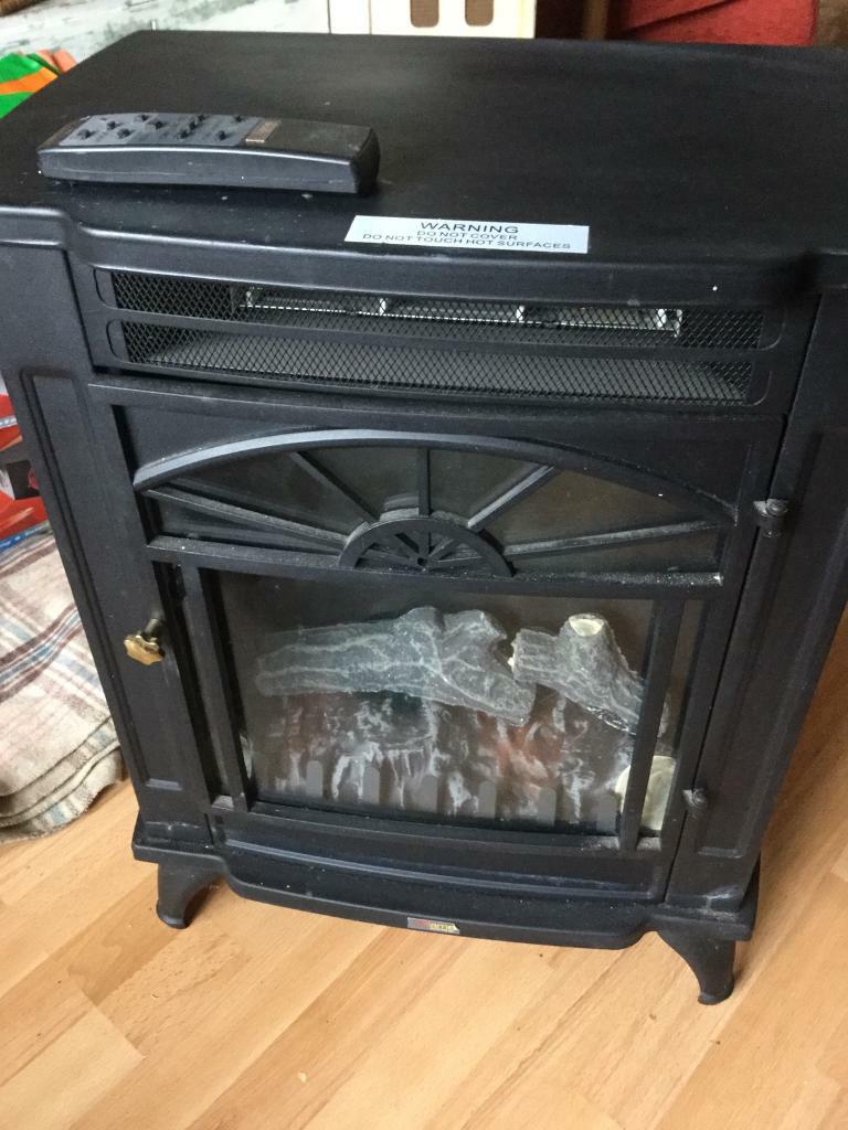 Remote electric fire wood burner stove effect fire. in Rubery, West