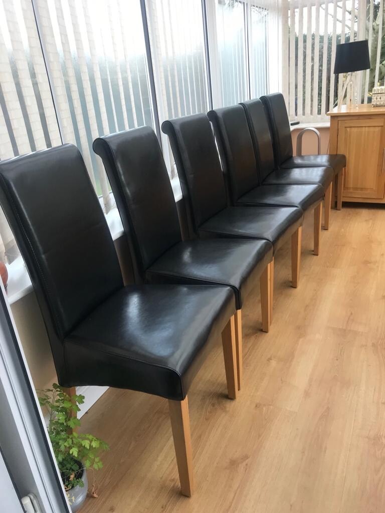 Oak furniture land 6 Genuine black leather dining chairs in Radcliffe