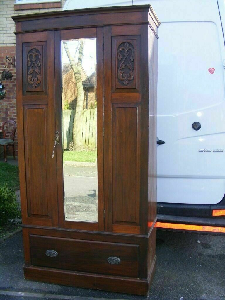 CAN DELIVER VICTORIAN ANTIQUE WARDROBE WITH MIRROR HAS CARVED DETAILS in Northallerton