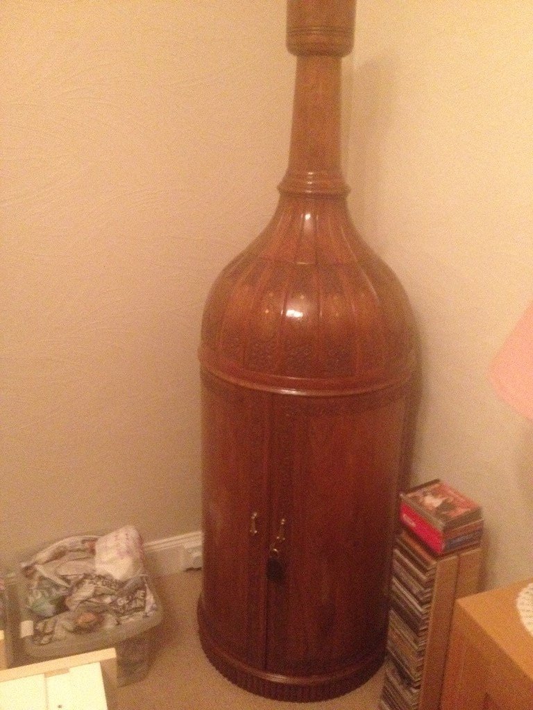 RARE MAHOGANY BOTTLE SHAPED DRINKS APPROX 6FT HIGH in
