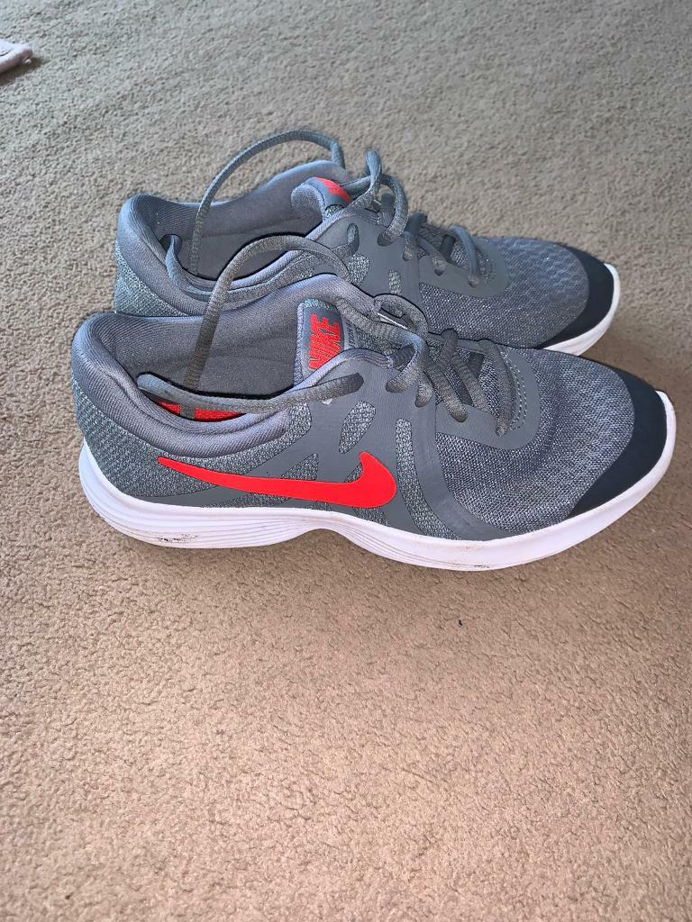 navy nike trainers kids