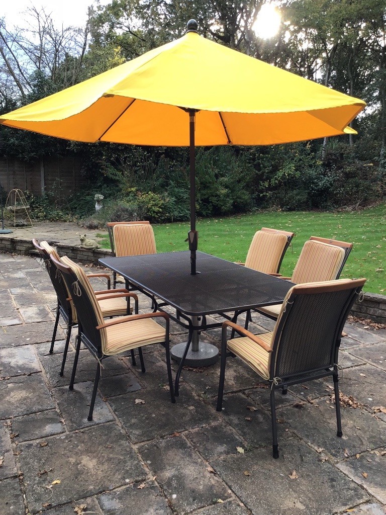 Royal Garden furniture. Table and 6 chairs plus parasol. Hardly used